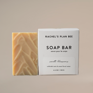 soap bar sitting next to soap box